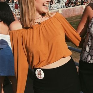 The Hanger Mustard Off-the-shoulder Top